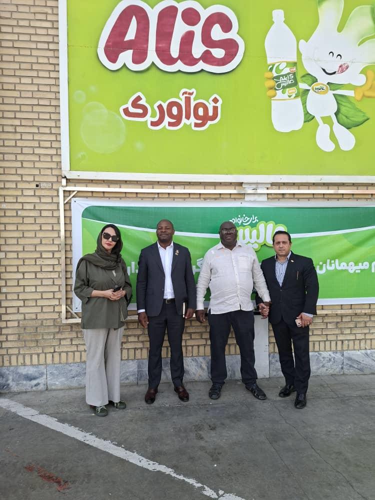 Ambassador B. Kupemba poses for a photograph after touring the an Alis Beverages Manufacturing  Plant in Mashhad