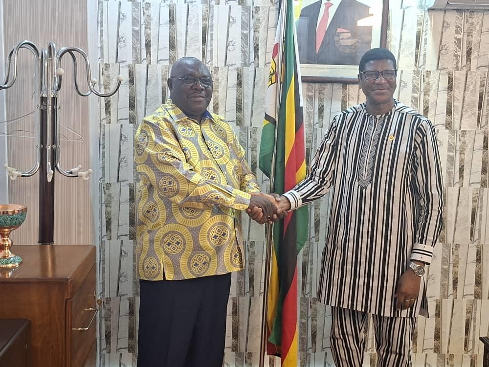 Ambassador B. Kupemba and His Burkinabe counterpart  H.E. Mr. Mohammad Kabore, share a handshake after their meeting in Tehran recently