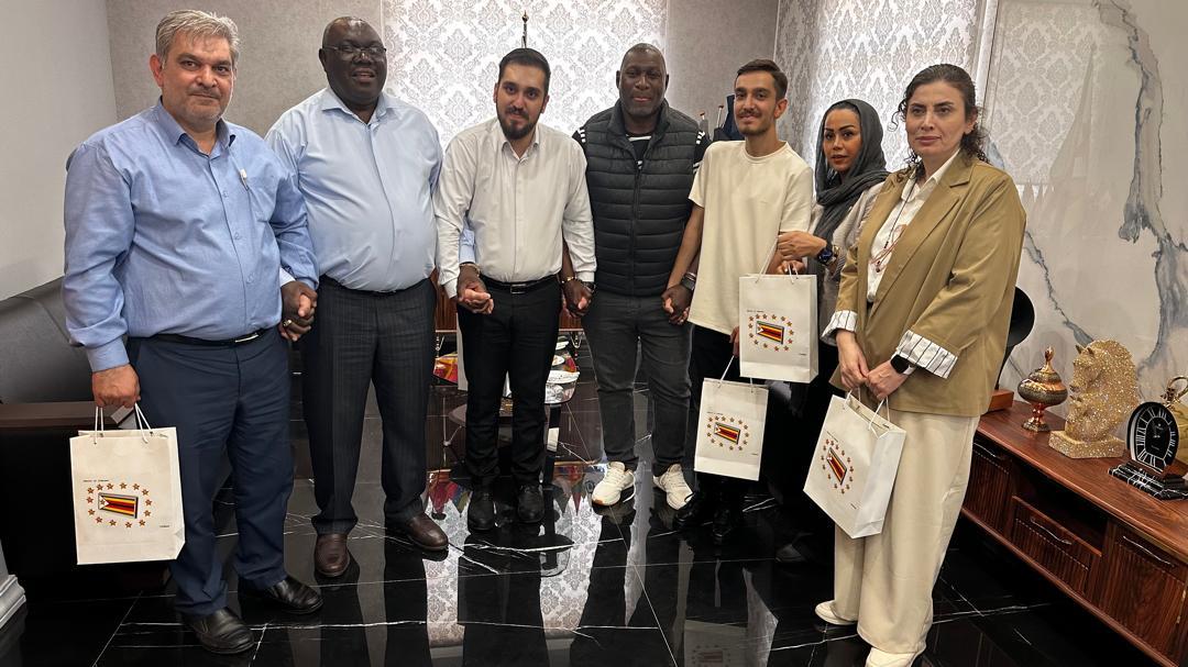 Ambassador Bright Kupemba in the company of Hon Collins Supa Mandiwanzira pose for a photo with Sun Machine Company delegation